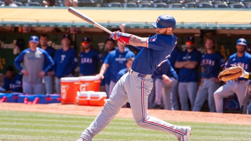 Rangers score 10 in second to roll past A&#39;s